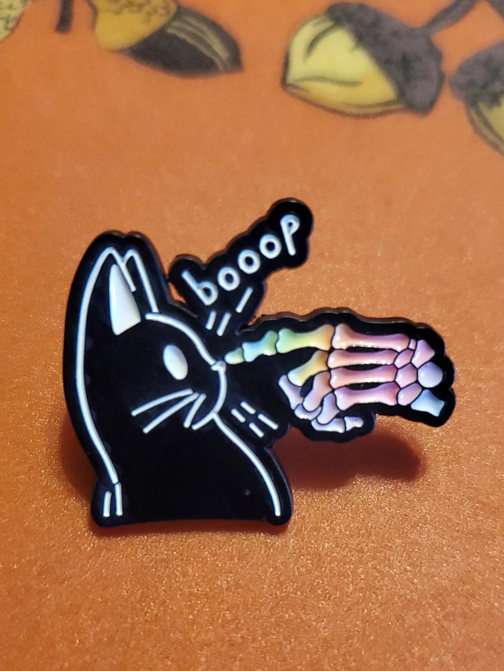 Black Cat Enamel Pin - 'Boop' Skeleton Paw with Rainbow Accent
